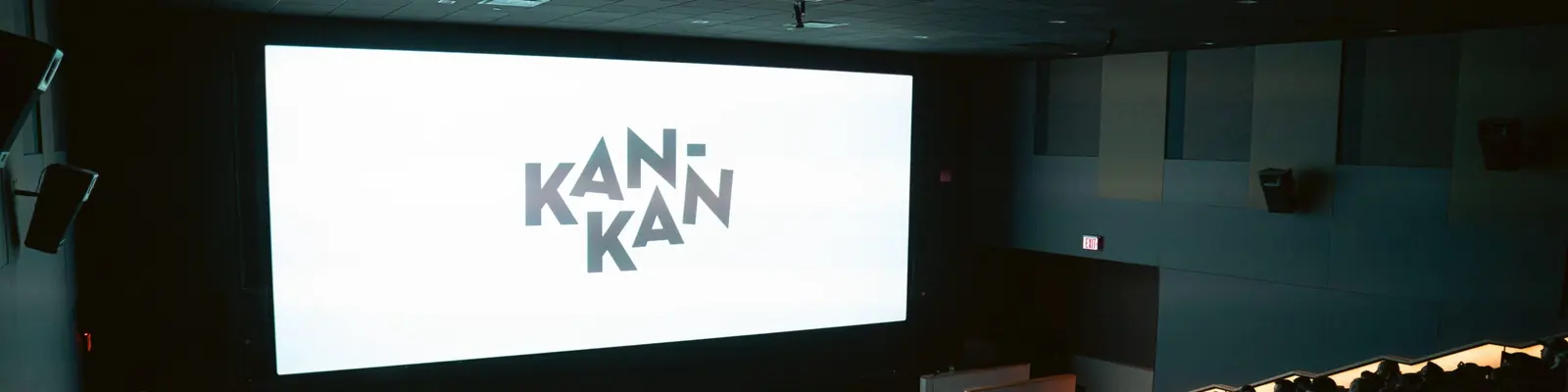 The Kan-Kan logo on a Kan-Kan auditorium screen