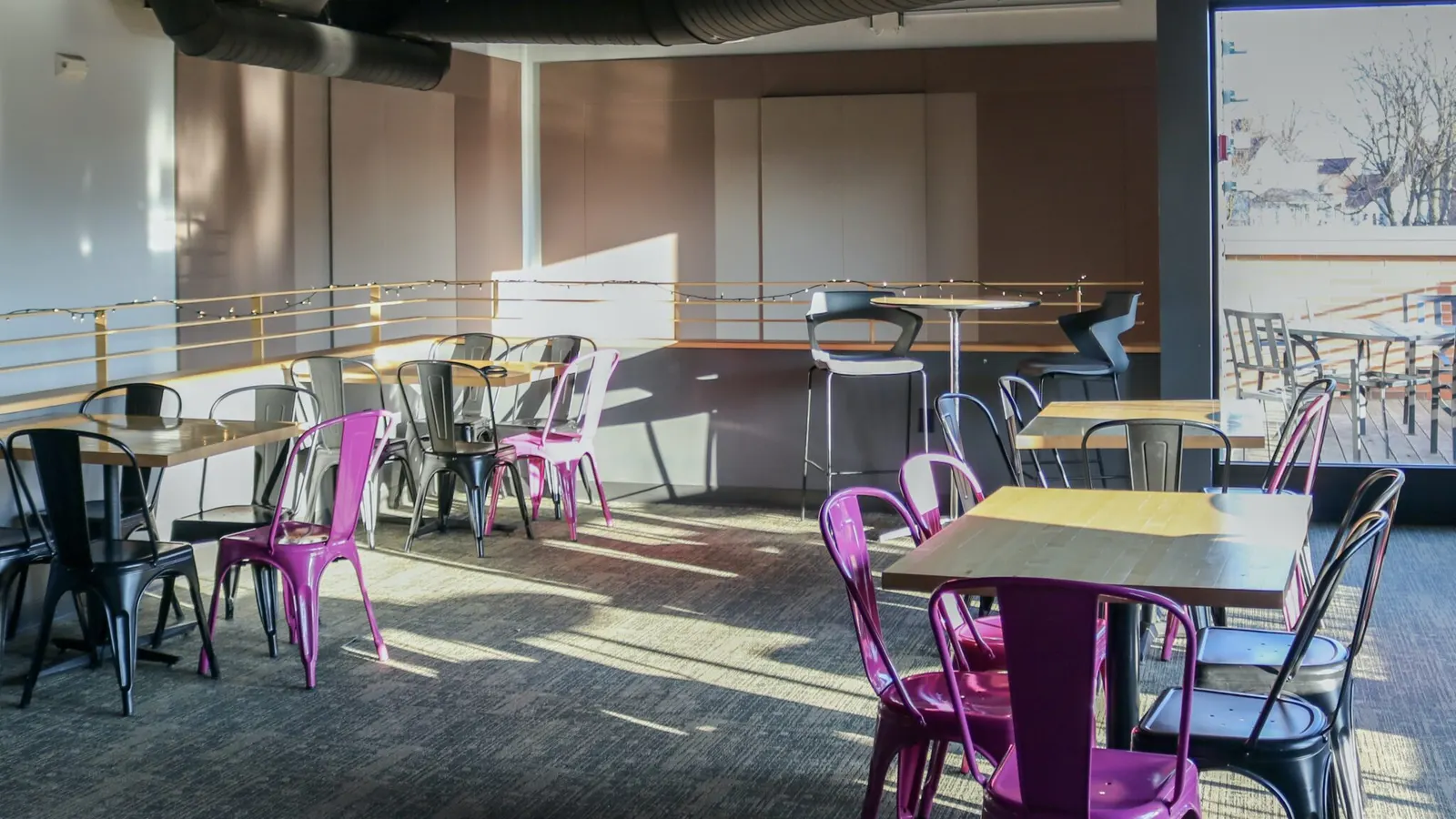 The Fraser event space, an open balcony overlooking the bar